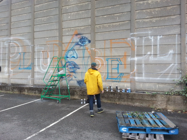 Jadryk Brown paints the Plurabelle Mural